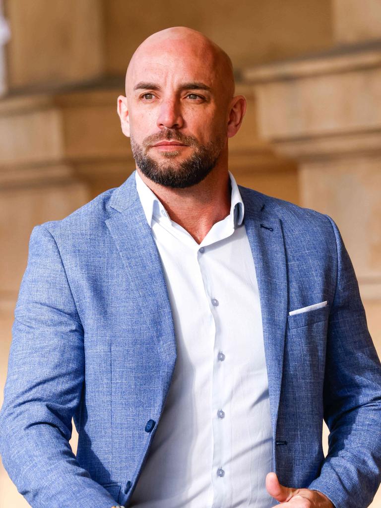 Matthew Thomson, former SAPOL detective on DV charges enters the Samuel Way building. Picture: Russell Millard Photography