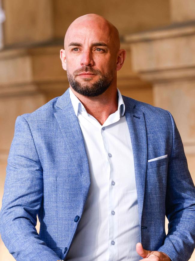 Matthew Thomson, former SAPOL detective on DV charges enters the Samuel Way building. Picture: Russell Millard Photography