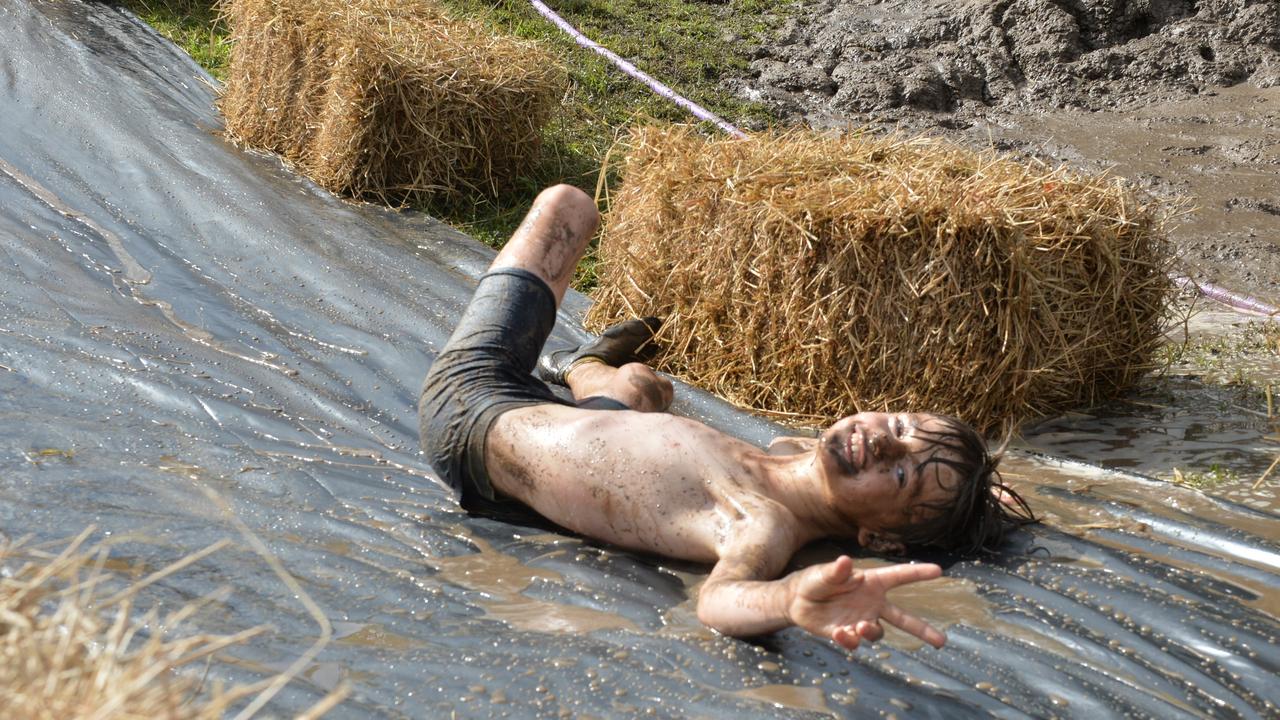 Axel Elliott, 10, sliding down at Mud World.