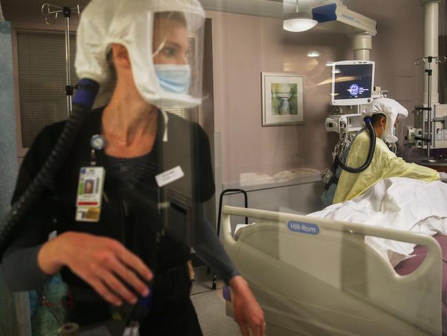 Registered nurses provide post-mortem care to a deceased COVID-19 patient in an Intensive Care Unit in La Mesa, California. Picture: Mario Tama/Getty Images/AFP