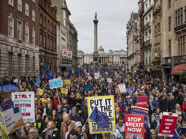 LONDON, UNITED KINGDOM - MARCH 23: Protesters take part in the Put It To The People March on Whitehall on March 23, 2019 in London, England. Thousands of protesters gathered in central London today to take part in the Put It To The People March. The march from Park Lane to Parliament Square was organised by the Peoples Vote campaign and is calling for a public vote on the Governments final Brexit deal. (Photo by Dan Kitwood/Getty Images) *** BESTPIX ***