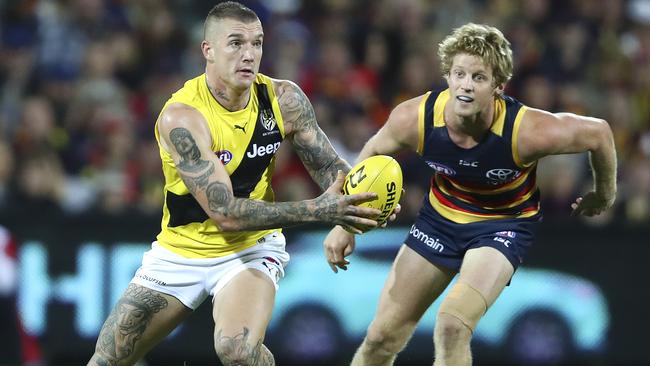 Dustin Martin gets away from Rory Sloane in Round 6. Picture Sarah Reed