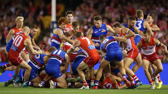 A melee breaks out before the opening bounce. Picture: Michael Klein