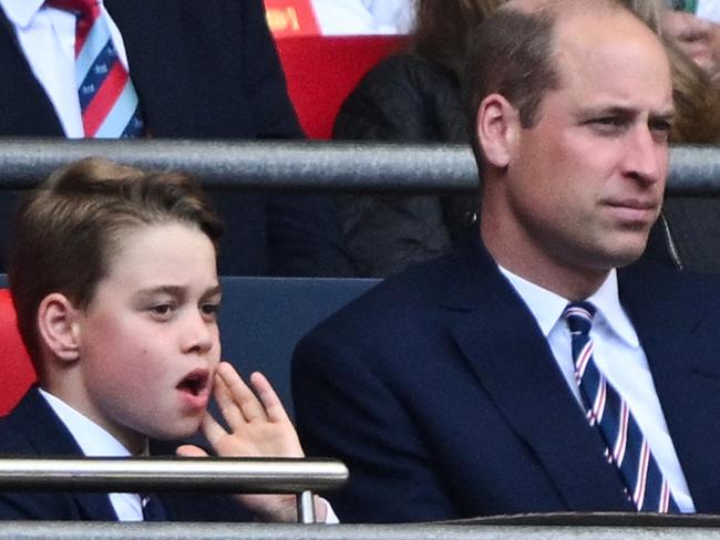 Britain's Prince George of Wales (L) and Britain's Prince William, Prince of Wales attend the English FA Cup final football match between Manchester City and Manchester United at Wembley stadium, in London, on May 25, 2024. (Photo by JUSTIN TALLIS / AFP) / NOT FOR MARKETING OR ADVERTISING USE / RESTRICTED TO EDITORIAL USE