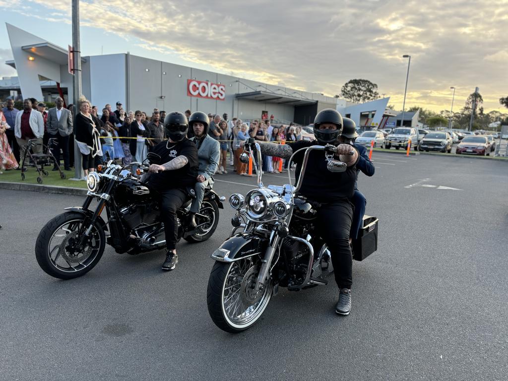 Brandon and Joseph Nerva arrive at the formal on Harley Davidson motorcycles.