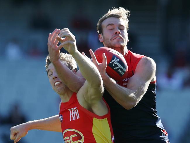 Jack Watts and Tom Lynch battle during the Demons win over the Suns. Picture: Michael Klein