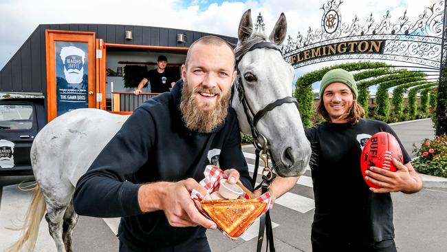 Max Gawn, his two brothers, Todd. (hat) and Adam (beanie) .The Bearded Jaffle van and 'Bear' (horse) at Flemington. Picture: Tim Carrafa