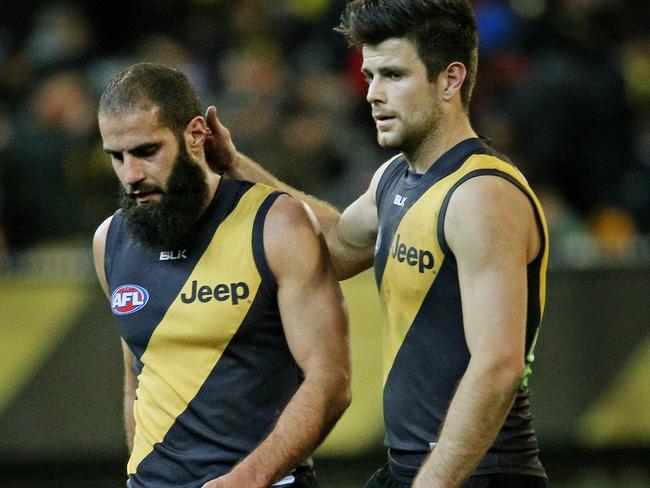 Trent Cotchin comforts Bachar Houli after the loss to Fremantle, where Houli made a critical error in the dying minutes. Picture: Colleen Petch