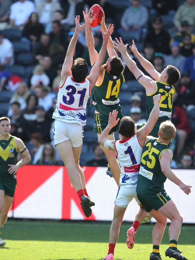 Leopold's Trevor Nofi flies high. Picture: Mike Dugdale