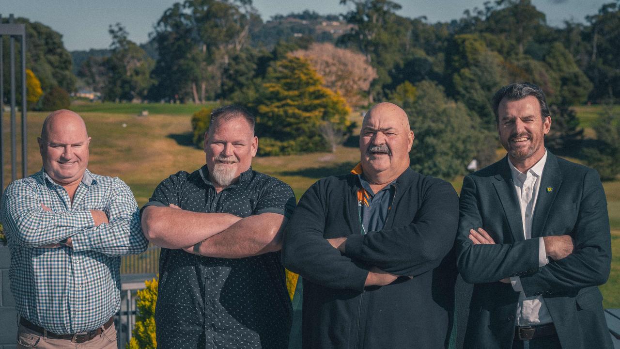 Tom Darke project manager Clubs Tasmania, Ben Carpenter president Tasmanian Hospitality Association, David Foster champion axeman, Brendon Gale CEO Tasmania Football Club. Launch of 'together, we are the team' poster and coaster campaign, a joint initiative by the Tasmania Football Club and the Tasmanian Hospitality Association. Picture: Tasmania Football Club