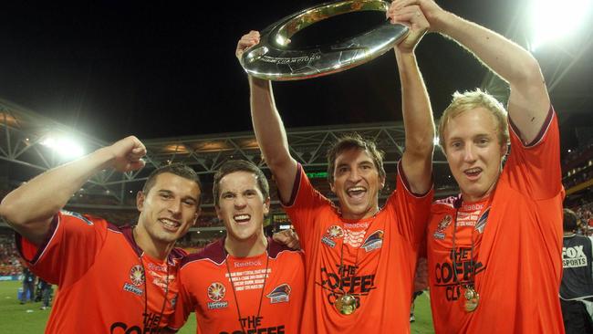 Brisbane Roar celebrate winning the 2011 A-League Grand Final.