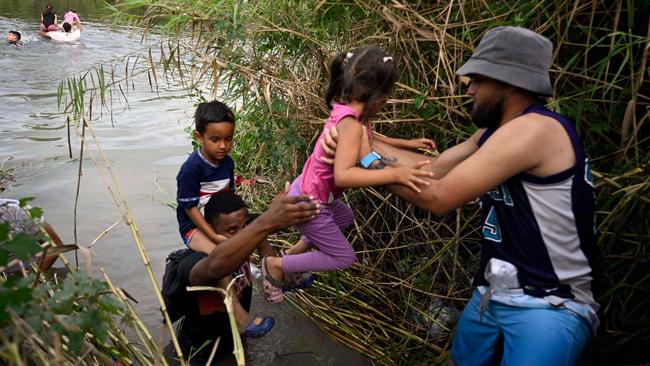 Migrants try to get to the US by crossing the Rio Grande, as seen from Matamoros, in the state of Tamaulipas, Mexico, on Wednesday. Picture: AFP