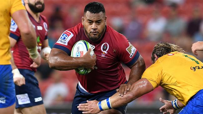 Reds prop Taniela Tupou takes on the Bulls defence.