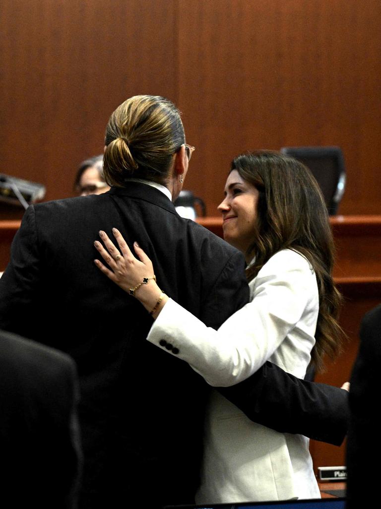 Vasquez embraces Depp in court. Picture: AFP