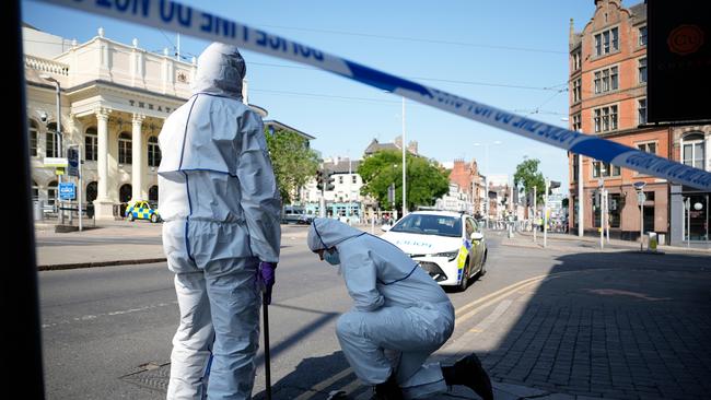 Forensic police search an area in the city centre after several people were attacked. Picture: Christopher Furlong/Getty Images