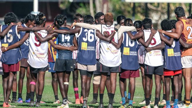 Teams come together post game in a weekend of Music, Sport and Culture at the Barunga Festival. Picture Glenn Campbell