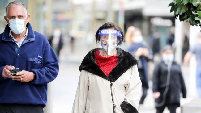 A woman wears a face shield in Sydney’s Bondi Junction. Picture: Ryan Osland