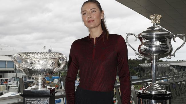 Maria Sharapova poses with the Australian Open trophies ahead of the 2020 Australian Open at Melbourne Park on January 12, 2020 in Melbourne, Australia. (Photo by Darrian Traynor/Getty Images)