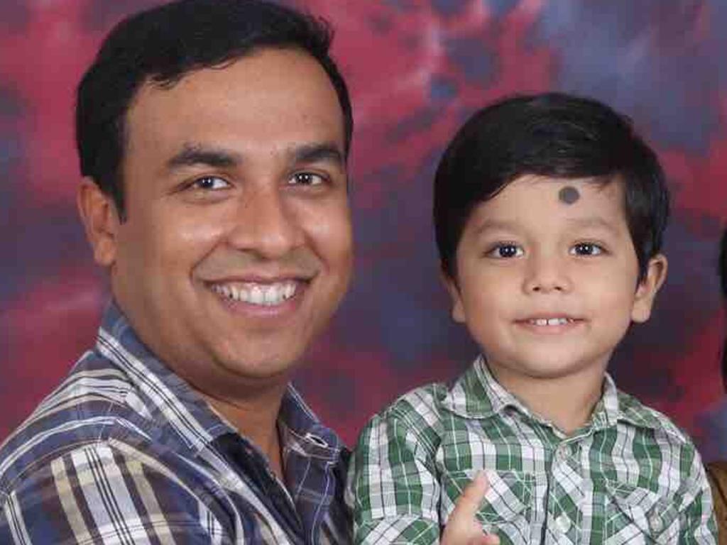 Four-year-old Mikolaj Barman and his father before Mikolaj’s operation.