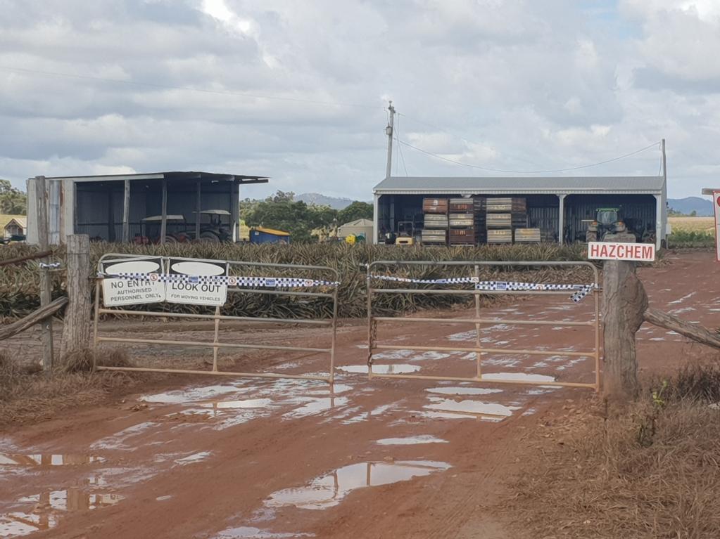 Police remain at the scene of the Wednesday, July 14, 2021 pineapple farm death. The incident occurred at Lake Mary Pines in Bungundarra.