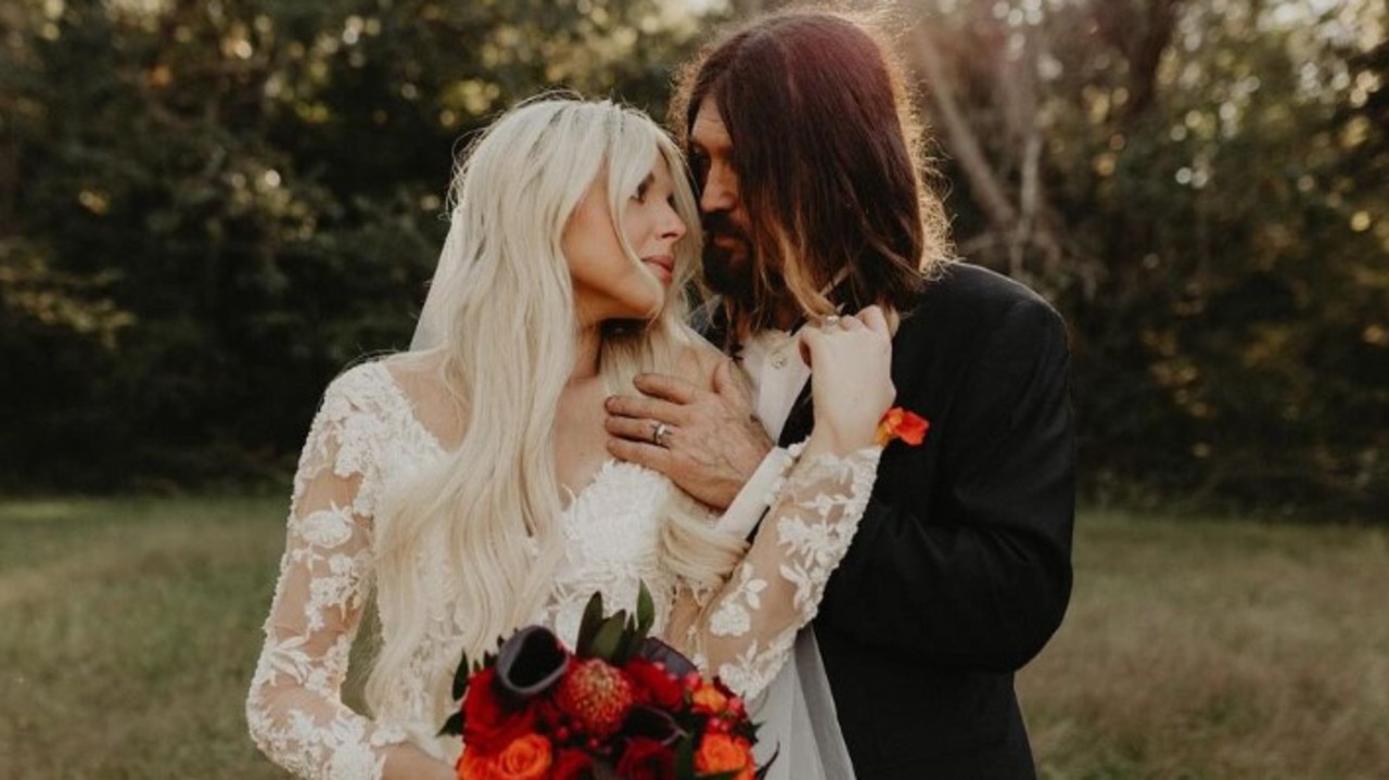 Happier times: Billy Ray Cyrus and Johanna Hodges aka Firerose on their wedding day.