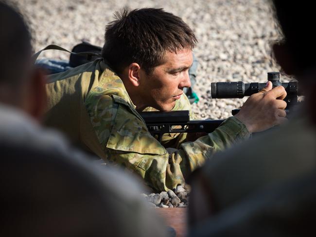 Australian Army soldier Corporal Keith Hall provides a lesson on advanced marksmanship to Iraqi Army soldiers at Taji Military Complex, Iraq. Picture: Defence Media