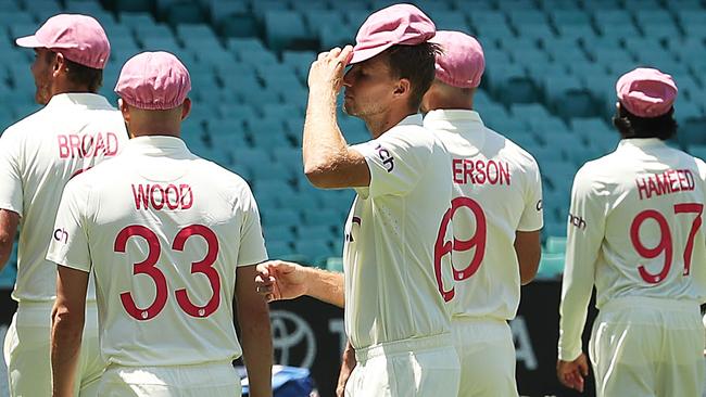 England captain Joe Root takes his pink cap off after a team photo at the SCG Picture: Getty Images