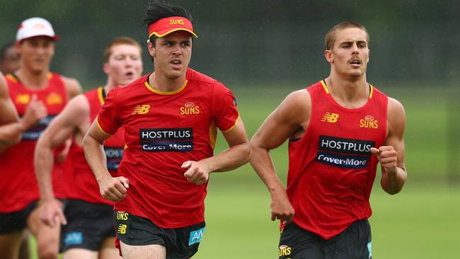 Elijah Hollands (left) was taken at pick 7 in the 2020 draft. Picture: Chris Hyde/AFL Photos/Getty Images