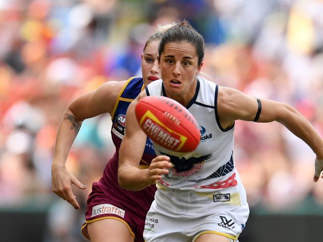 Former Waratah star Angela Foley attacks the ball for Adelaide Crows during the 2017 AFLW Grand Final against Brisbane at Metricon Stadium. Picture: AAP Image/Dan Peled