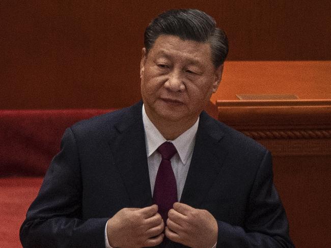 BEIJING, CHINA - APRIL 08: Chinese President Xi Jinping adjusts his jacket at a ceremony to honour contributions to the Beijing 2022 Winter Olympics and Paralympics at the Great Hall of the People on April 8, 2022 in Beijing, China. (Photo by Kevin Frayer/Getty Images)