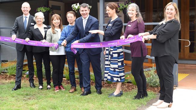 At the official ribbon cutting opening of HammondCare's Bugari Cottage respite facility at Terrey Hills on Thursday were, from left, HammondCare At Home General Manager Bay Warburton, Northern Beaches Deputy Mayor Sue Heins, Carer Kazu Murai and husband Seiji Murai, HammondCare Chief Executive Mike Baird, Federal Member for Mackellar Sophie Scamps, Bugari Cottage Manager Elaine Collins and HammondCare Head of Events Carla Messer. Picture: HammondCare