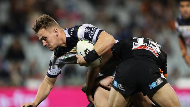 Cowboy Coen Hess bends the line against the Tigers. Picture: Brett Costello