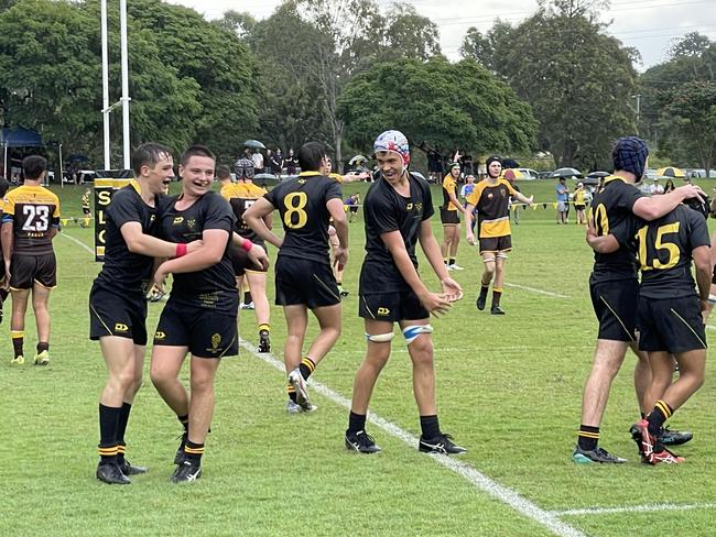 St Laurence's College winger Brody McLaren celebrates his try.