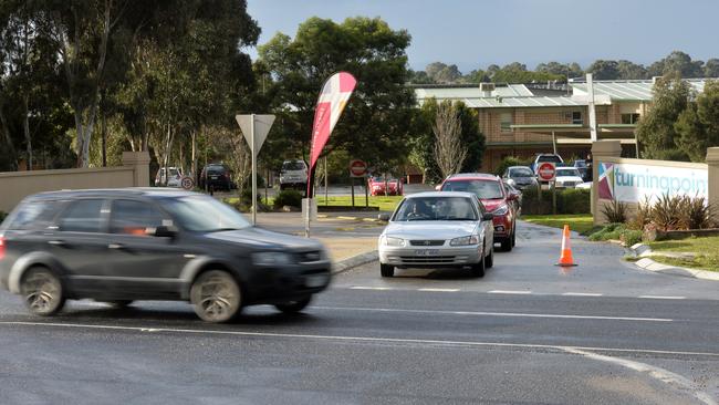 Lighthouse Christian College parents pick up their children from school days after the smash which killed a student and her mother. Picture: Chris Eastman