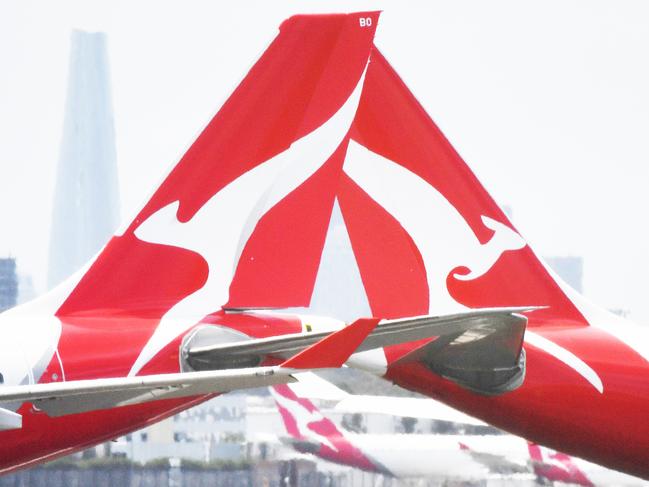 Qantas aircraft are seen at Sydney Airport, Thursday, 24 December 2020. Authorities are urgently investigating how a Qantas crew member contracted Covid-19 after arriving in Darwin from Paris and then flying to Sydney without being tested or quarantined. Federal health authorities are working with Qantas to understand how the man, who landed in Darwin on 17 December after working on a repatriation flight from Paris, became infected. Picture - Sam Mooy/The Australian Newspaperescape january 17 2021doc holiday