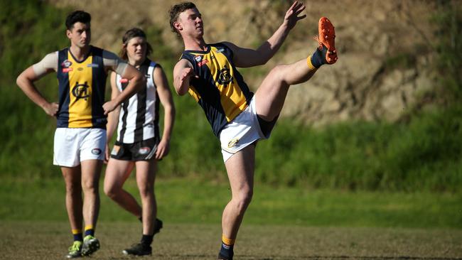 NFL: Hurstbridge’s Joel Naylor fires on goal. Picture: Hamish Blair