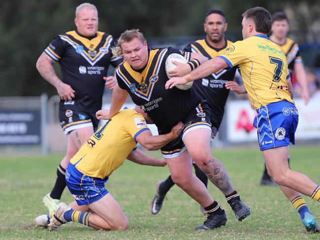 Jets second rower Jonah Longbottom tries to run through the defence. Picture: Steve Montgomery/Ourfootyteam