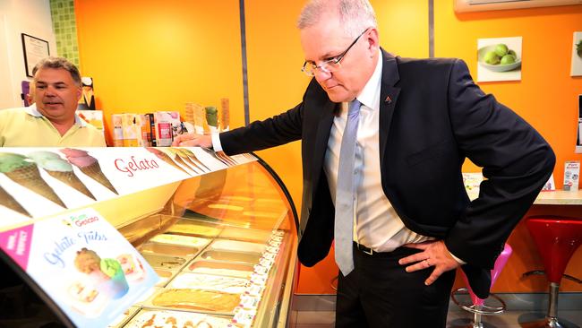 Scott Morrison visits Pure Gelato in Canberra yesterday during an effort to spruik the Coalition’s revamped energy policy. Picture: Kym Smith