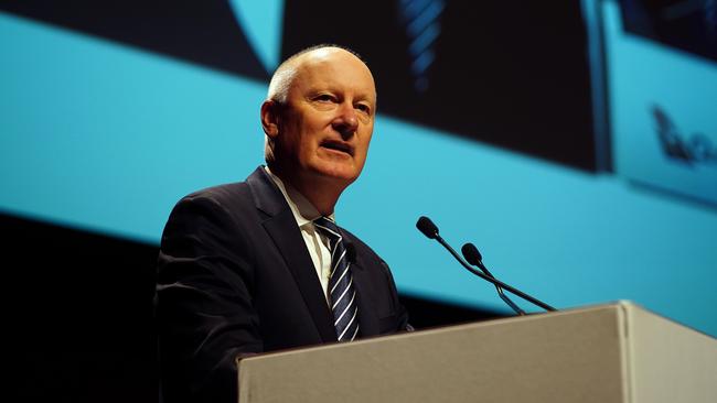 Qantas chairman Richard Goyder, left, earned more than $1.6m from his role at the airline and in his capacity of being Woodside’s chair. Picture: NCA NewsWire / Luis Ascui