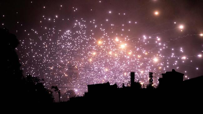 Sparks fly at the site of an Israeli air strike on the outskirts of the southern Lebanese village of Zawtar. Picture: AFP