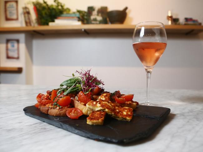                         <span id="U6141586718869WB" style="font-weight:bold;font-style:normal;">CREATIVE:</span> Caffiend’s tomato and chorizo served with a glass of rose. Picture: BRENDAN RADKE.