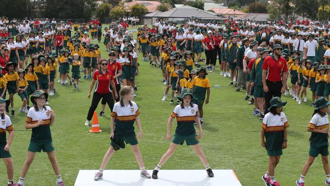 Nearly 2000 students, staff, parents and more joined in to dance up a storm and try to make it into the history books. Picture Glenn Hampson