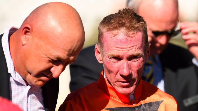 Trainer Stephen Lee (left) will play a leading roll in a number of races at Lismore on Thursday. Picture: AAP Image