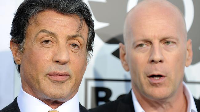 Sylvester Stallone and Bruce Willis pictured in 2010. Picture: Gabriel Bouys/AFP