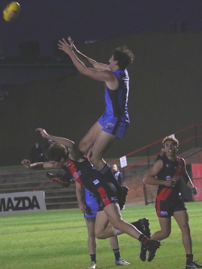 Sturt's Lachlan Burrows flies for a big mark in the reserves against West Adelaide on Friday night. Picture: Peter Nelson