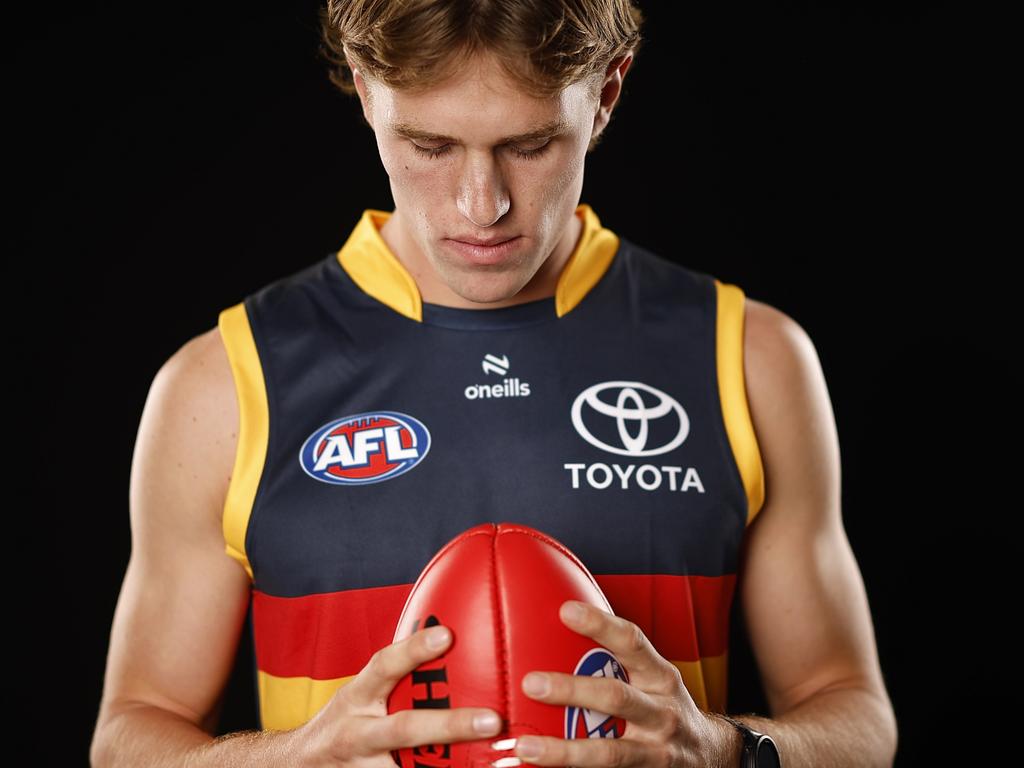 Curtin tries on Crows colours for the first time after the draft. Picture: Daniel Pockett/Getty Images