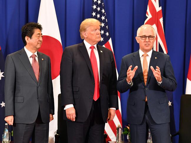 Shinzo Abe, Donald Trump and Malcolm Turnbull in Manila today. Picture: AAP/Mick Tsikas