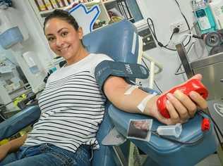 CHRISTMAS DONATIONS: Holly Lucas, is giving blood again in Gladstone after a recent break due to pregnancy, but says it's worth the effort to save three lives. Picture: Matt Taylor GLA201217BLOOD