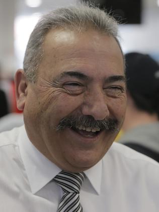Myer Hobart manager Peter Monachetti is all smiles at the store’s reopening.