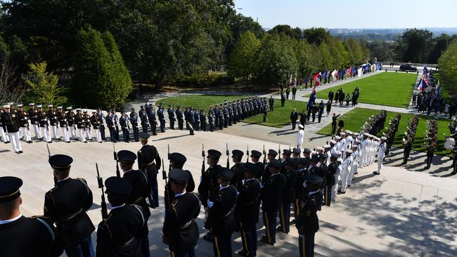 Mr Morrison arrives at the Arlington Cemetery to lay a wreath at the Tomb of the Unknown Soldier in Washington DC on Sunday.